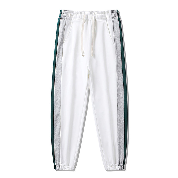 Herren Konische Trackhose mit Kordelzug, seitlichen Colorblock‑Streifen & elastischen Bündchen Echoarchiv