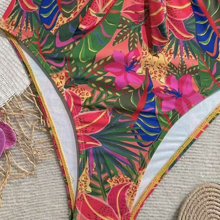 Damen Einteiler Badeanzug mit dekorativem Knotendetail und verspieltem Floraldesign Echo Archiv
