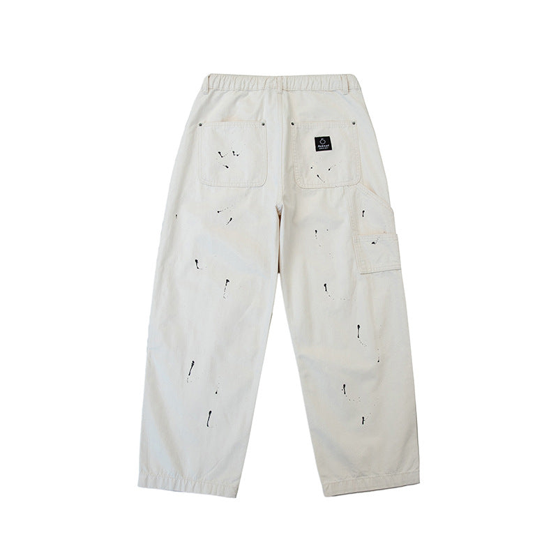 Unisex Weite Canvas-Hose mit elastischem Bund, Tunnelzug und Paint‑Splatter‑Details Echoarchiv