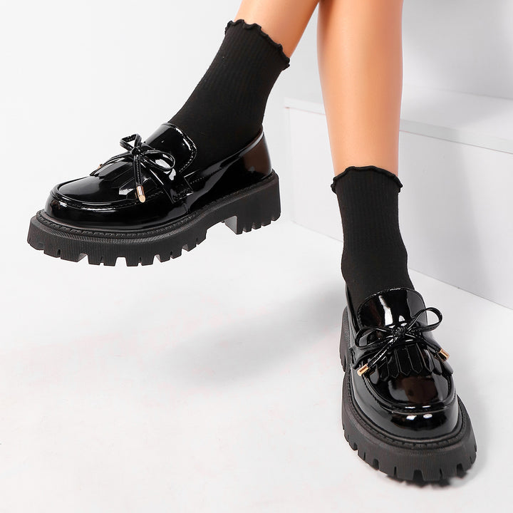 Damen  Lackoptik Loafer mit Quastenfransen Zierschleife und robuster Traktorsohle Echo Archiv
