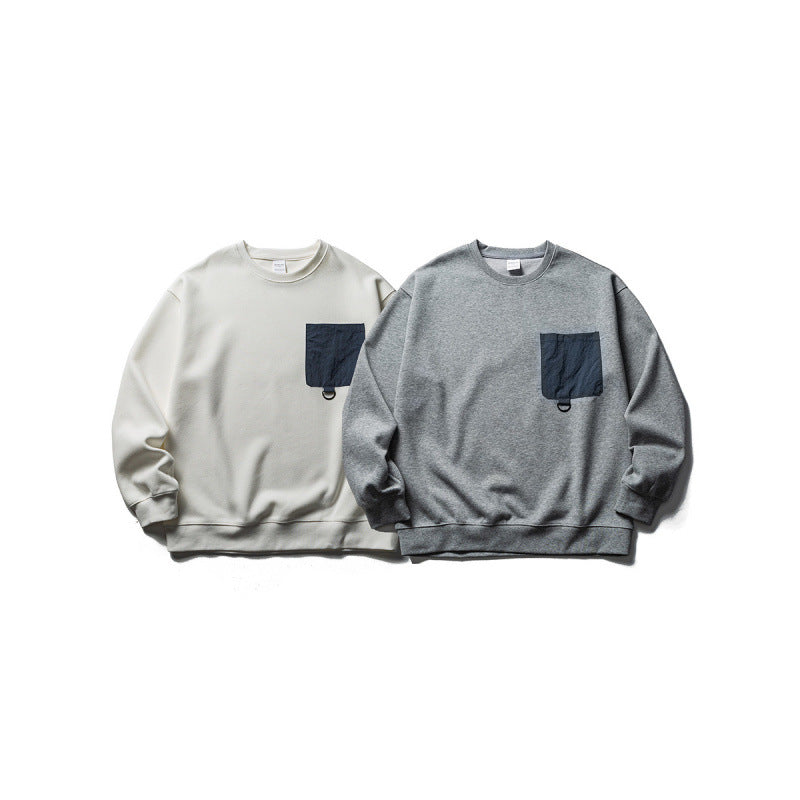 Unisex Oversize-Sweatshirt mit kontrastierender Brusttasche und D-Ring Echo Archiv