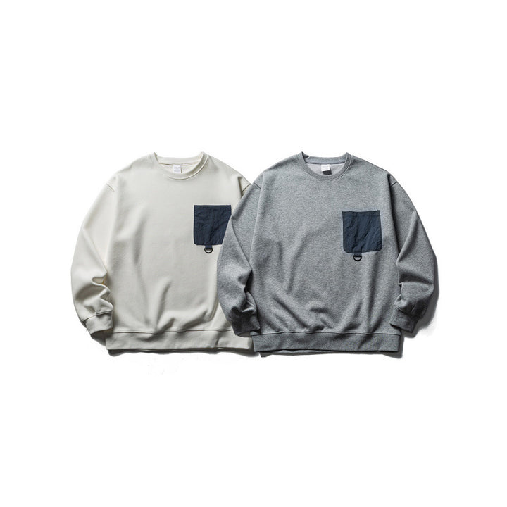 Unisex Oversize-Sweatshirt mit kontrastierender Brusttasche und D-Ring Echo Archiv