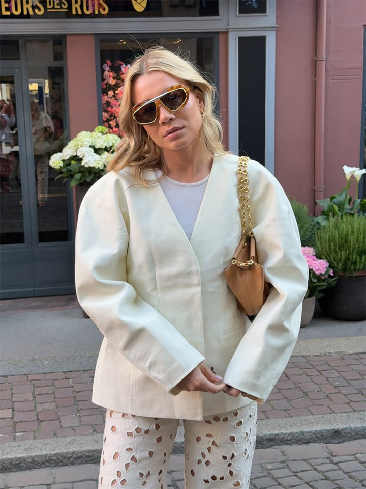 Damen Oversize-Blazer mit markanter Schulter und offener V‑Front Echoarchiv