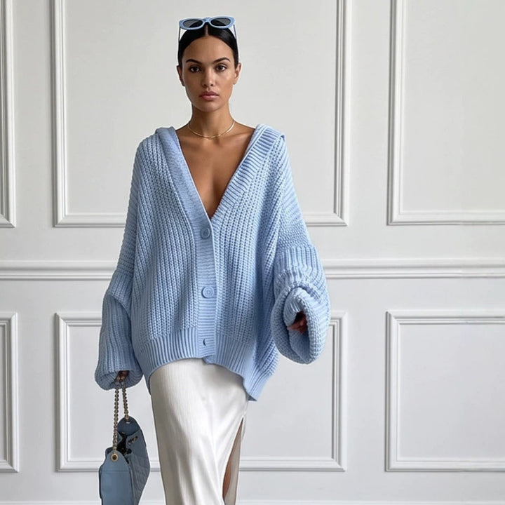 Damen Oversized Kapuzen-Strickcardigan mit Ballonärmeln und Knopfleiste Echoarchiv