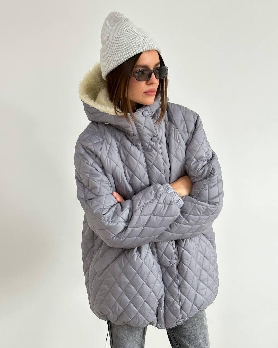 Damen Oversize Steppjacke mit Teddyfutter und Kapuze Echoarchiv