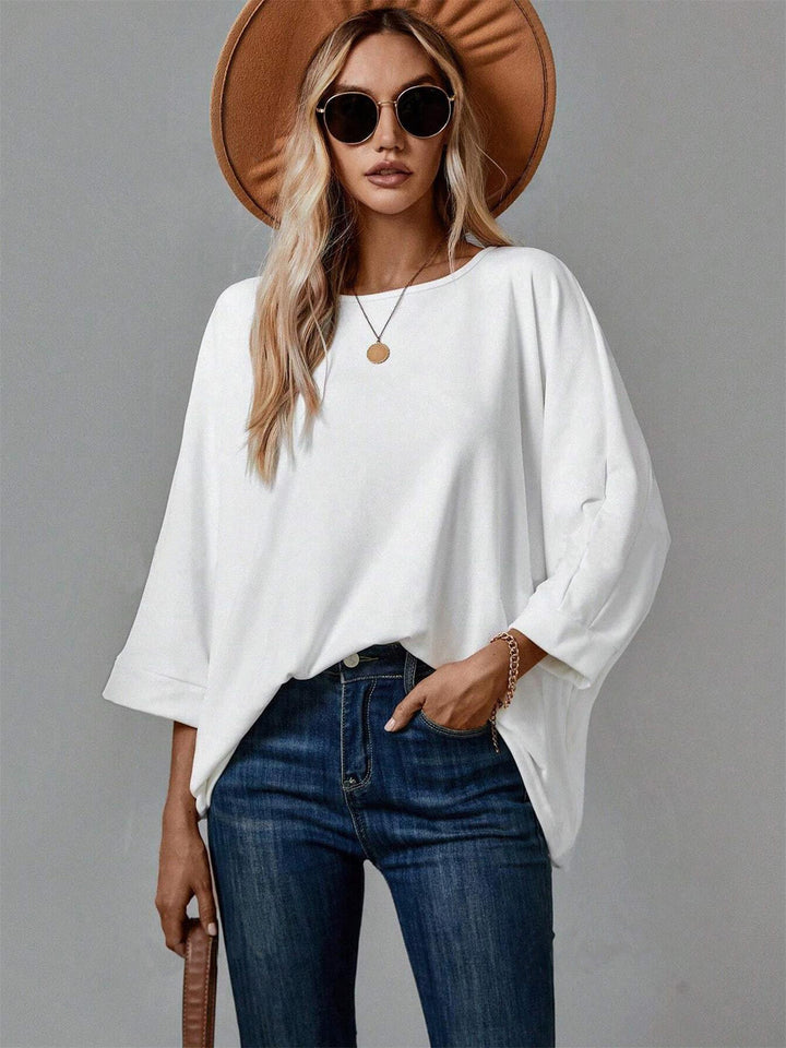 Damen Oversize Tunika‑Bluse mit U‑Boot‑Ausschnitt und dreiviertelärmeln Echoarchiv
