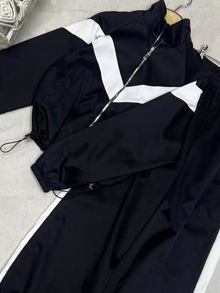 Damen Retro-Trainingsanzug mit Reißverschlussjacke und elastischer Bundhose Echoarchiv