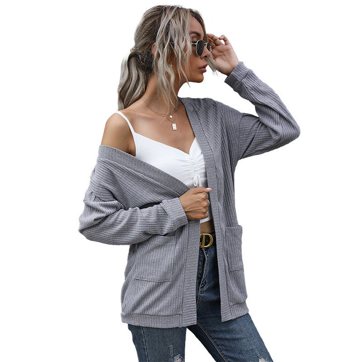 Damen Lockerer Feinstrick-Cardigan mit geripptem Strukturstrick und aufgesetzten Taschen Echoarchiv