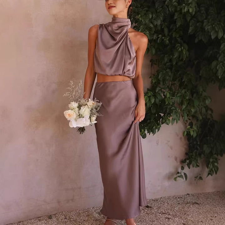 Damen elegante Zweiteiler mit ärmellosem Oberteil und schwingendem Rock Echo Archiv