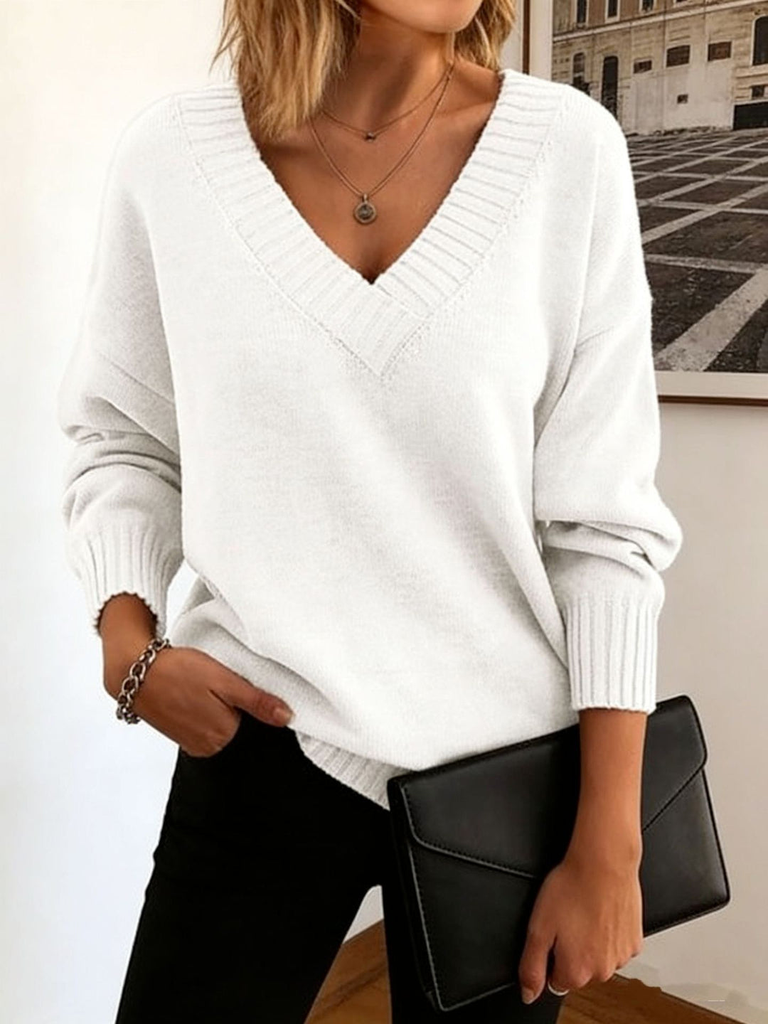 Damen Feinstrickpullover mit tiefem V-Ausschnitt und überschnittener Schulter – Mavelle