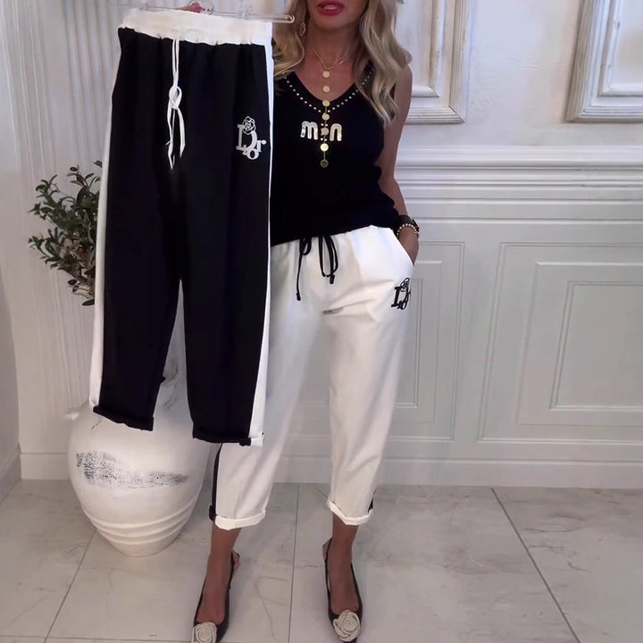 Damen nan Cropped-Jogginghose mit kontrastierendem Bund, seitlichem Zierstreifen, Kordelzug und Logostickerei Echo Archiv