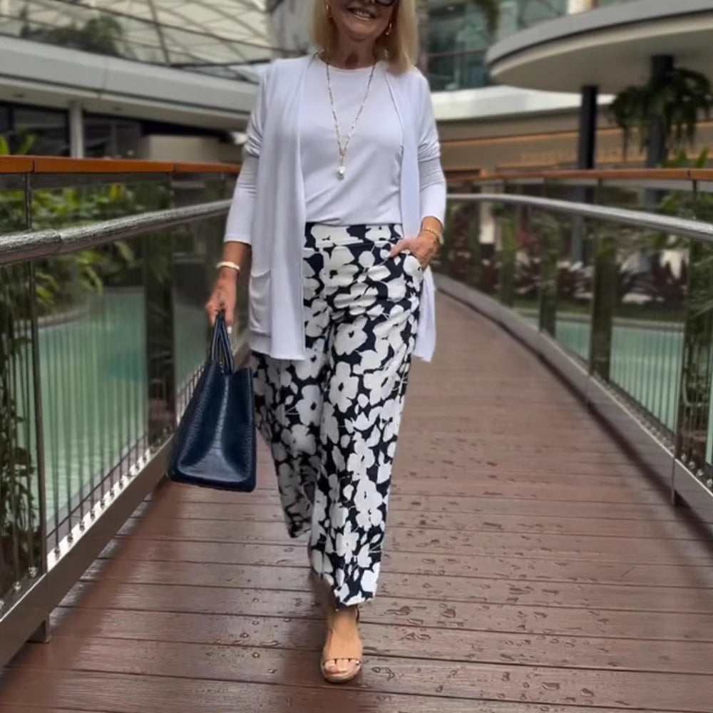 Damen nan weite Palazzohose mit großblumigem Print, hohem Bund und Eingrifftaschen Echo Archiv