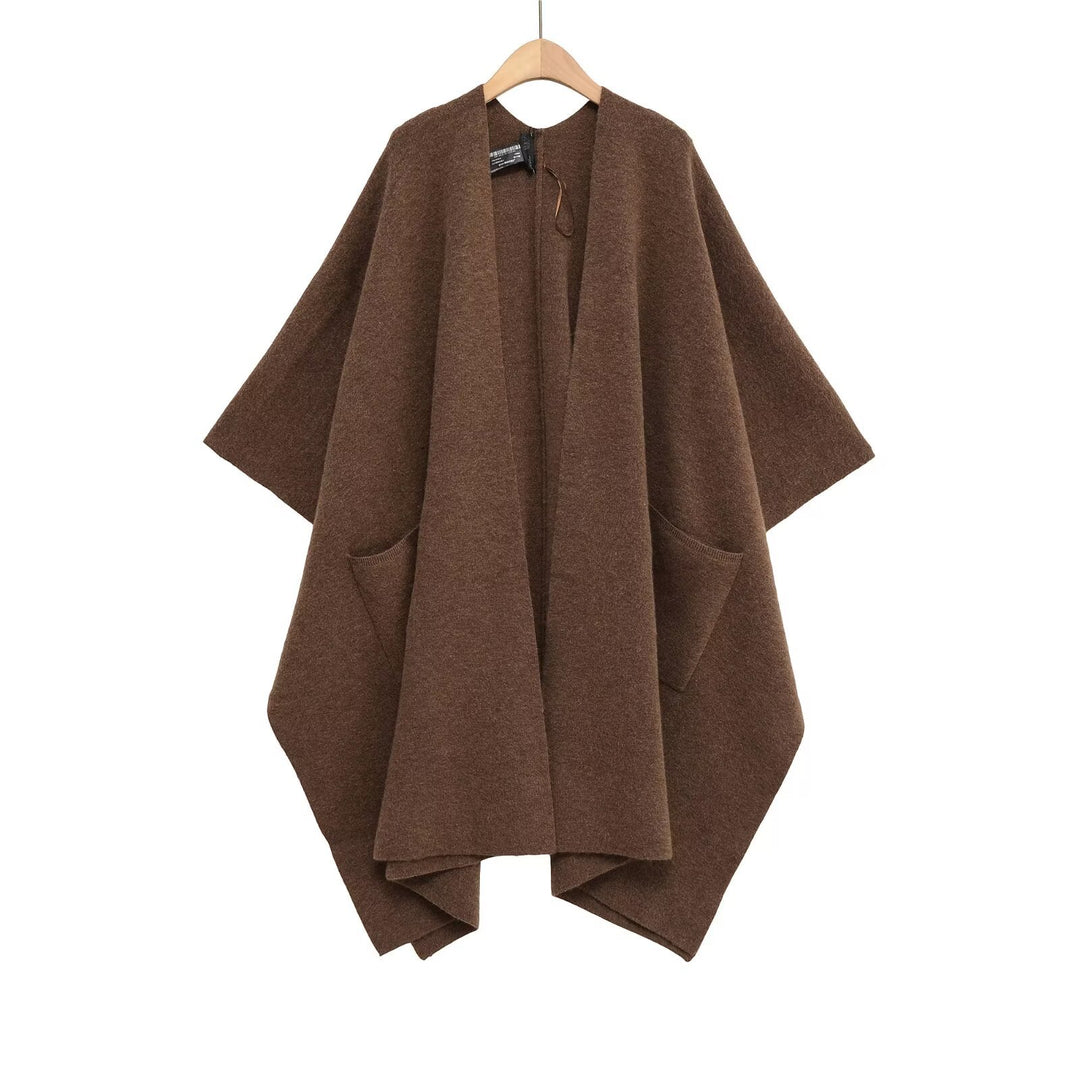Damen Oversize Strickponcho mit Eingrifftaschen und asymmetrischem Saum Echo Archiv