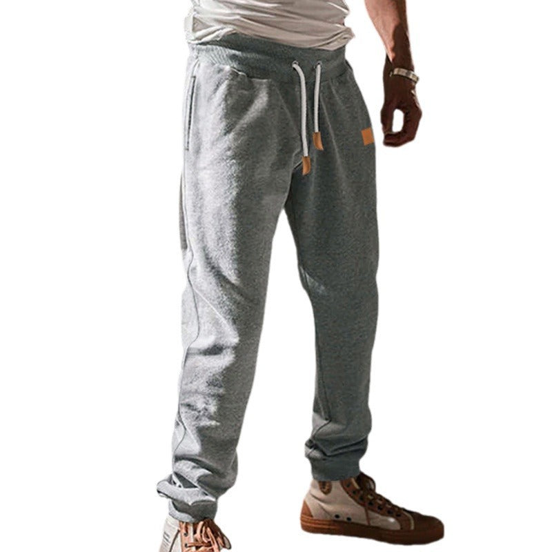 Herren Slim-Fit Jogginghose mit elastischem Bund, Kordelzug und schmalem Beinabschluss Echoarchiv