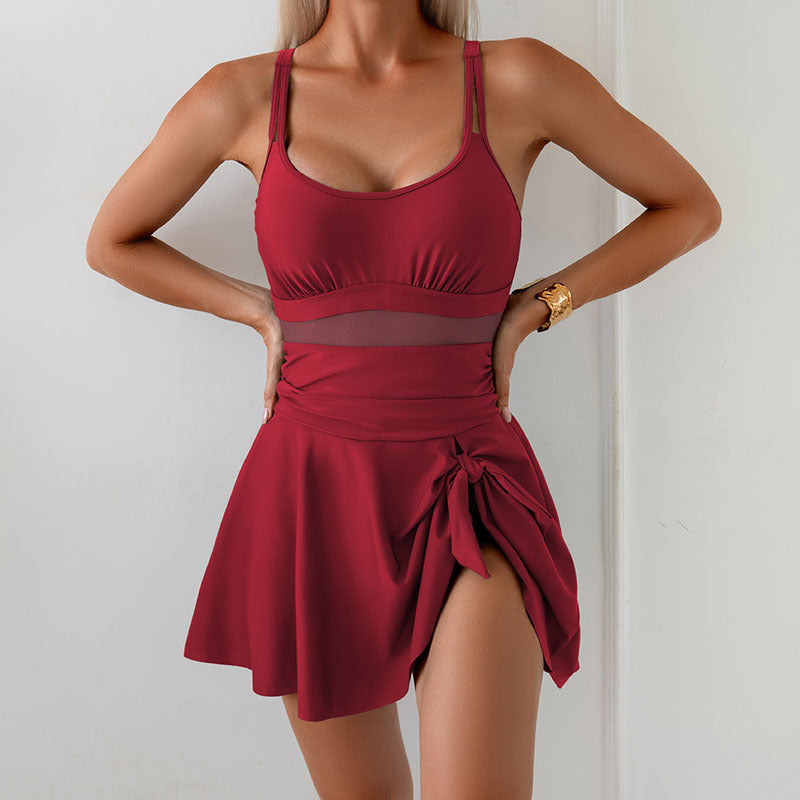 Damen eleganter einteiliger Badeanzug mit durchsichtigen Einsätzen und seitlichem Rock Echo Archiv
