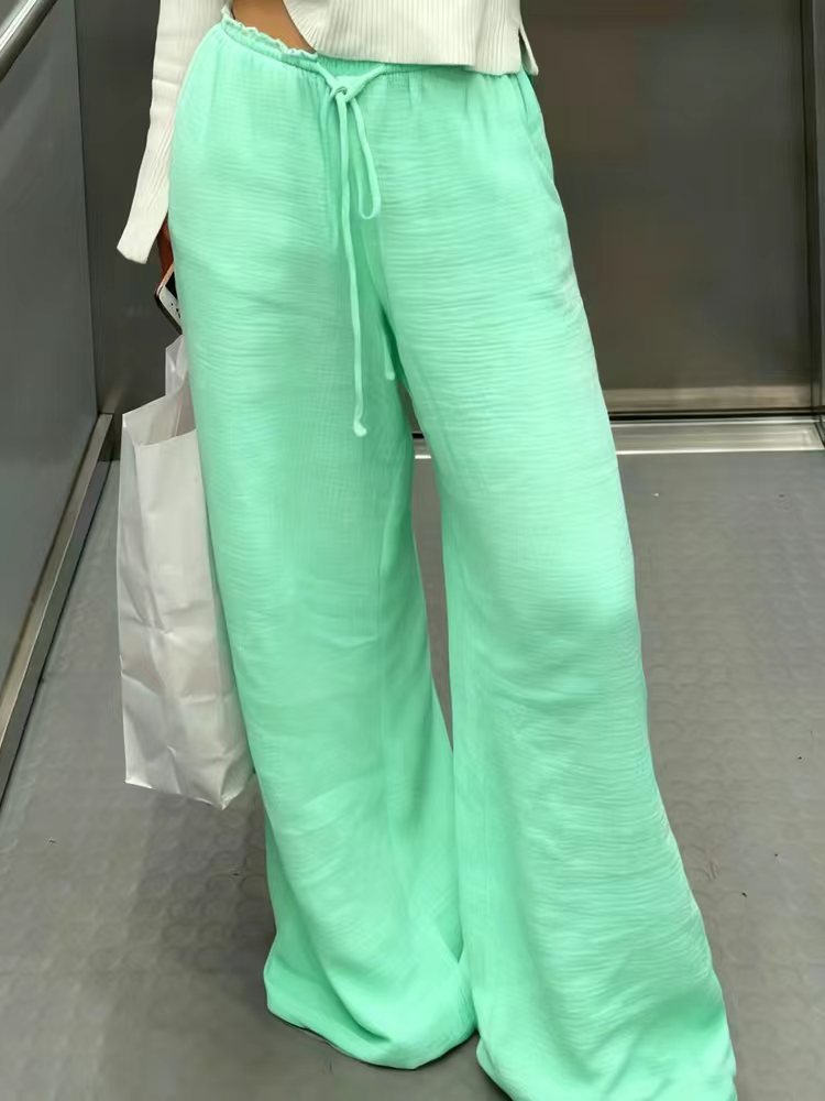Damen Leinenhose mit lockerer, knöchellanger Passform, seitlichen Eingrifftaschen und Zierknopf-Details – Avélisse