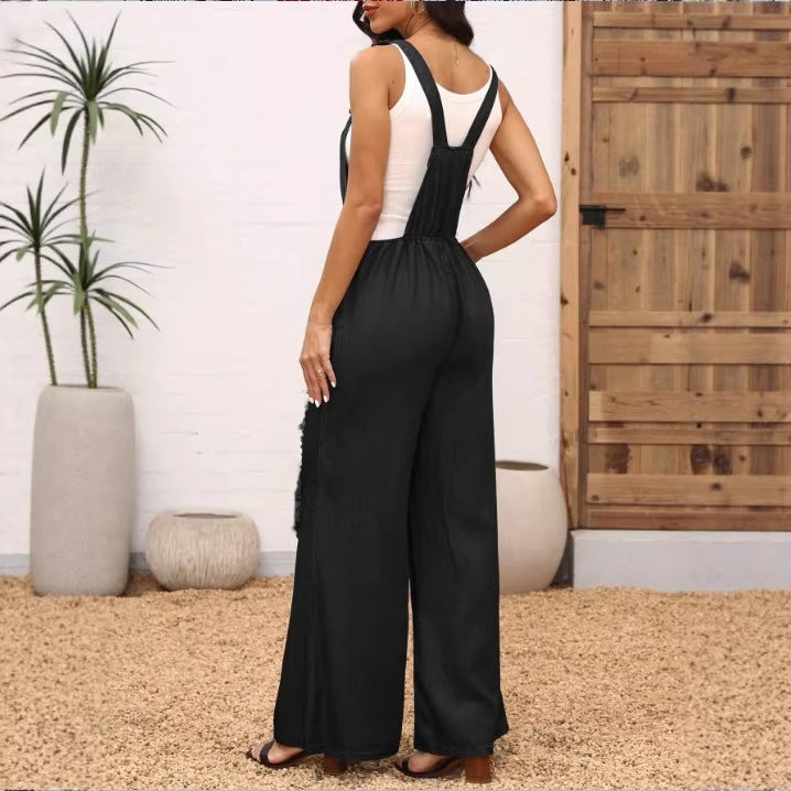 Damen weite Distressed-Latzhose mit verstellbaren Trägern und großen Knie-Rips Echo Archiv