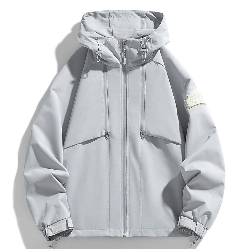 Unisex Leichte zweifarbige Wind- und Regenjacke mit Kapuze, Kordelzug und Reißverschlusstaschen Echoarchiv