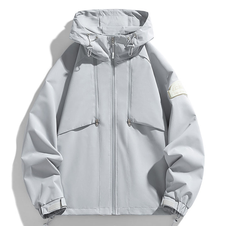 Unisex Leichte zweifarbige Wind- und Regenjacke mit Kapuze, Kordelzug und Reißverschlusstaschen Echoarchiv