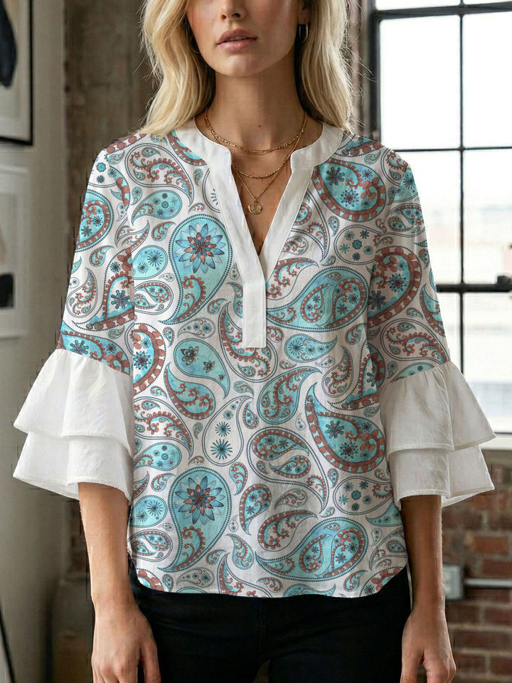 Damen Blusenshirt mit voluminösen Ärmeln und kreativem Druckdesign Echo Archiv