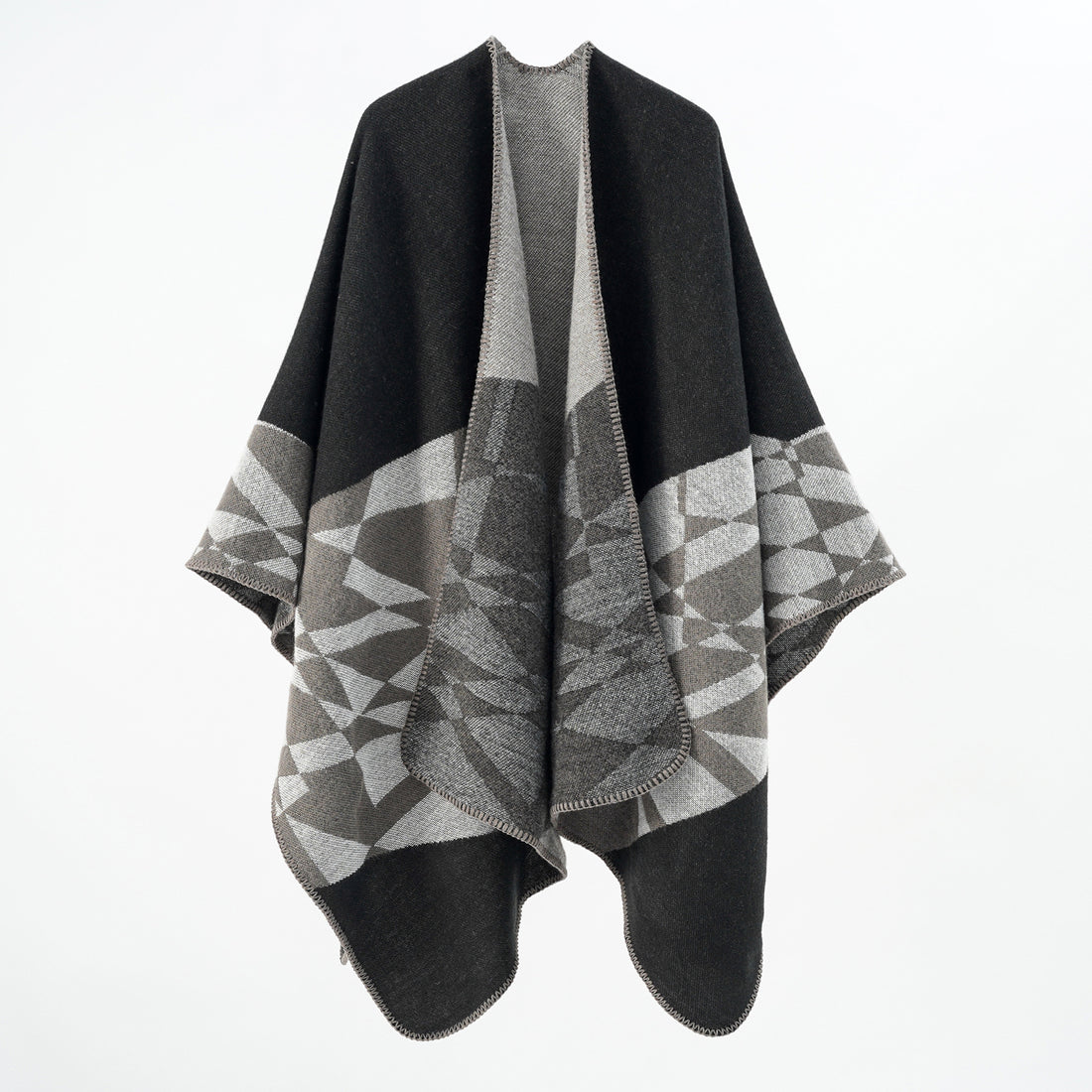 Damen Großer Strickponcho im Cape‑Schnitt mit Ziernaht und geometrischem Intarsia – Veloura