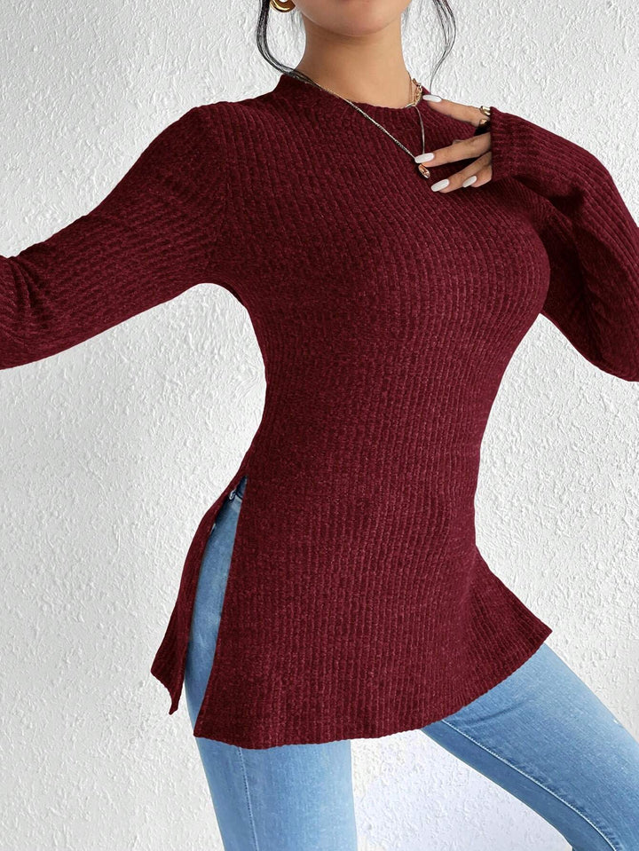 Damen Gerippter Taillierter Feinstrick-Pullover mit Stehkragen, langen Ärmeln und Seitenschlitzen Echoarchiv