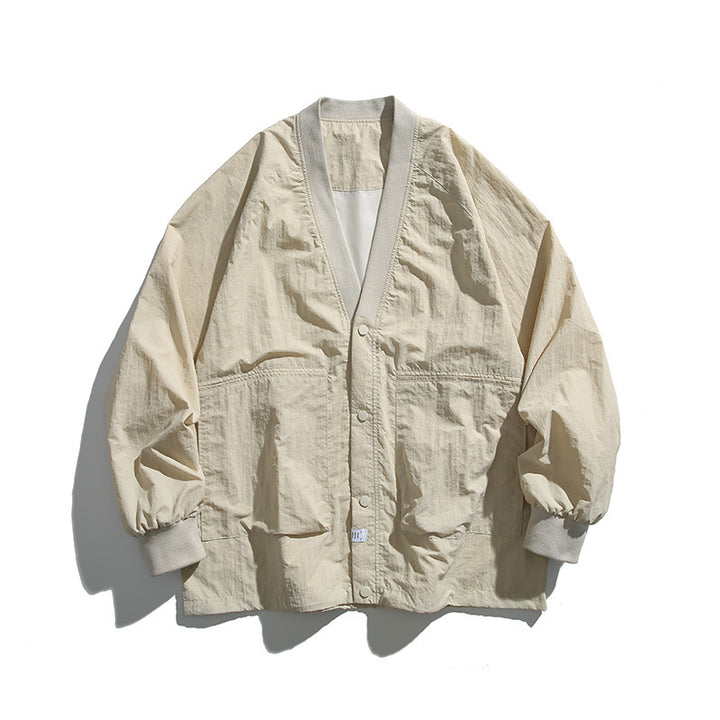 Unisex Weitgeschnittene Leichte Übergangsjacke mit V-Ausschnitt und Druckknopfleiste Echo Archiv