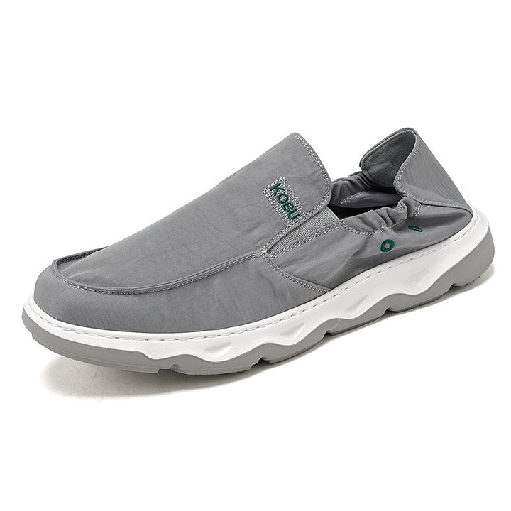 Herren elastischer Nubukoptik-Slipper mit gepolstertem Fersenrand und stoßdämpfender Wellenlaufsohle Echo Archiv