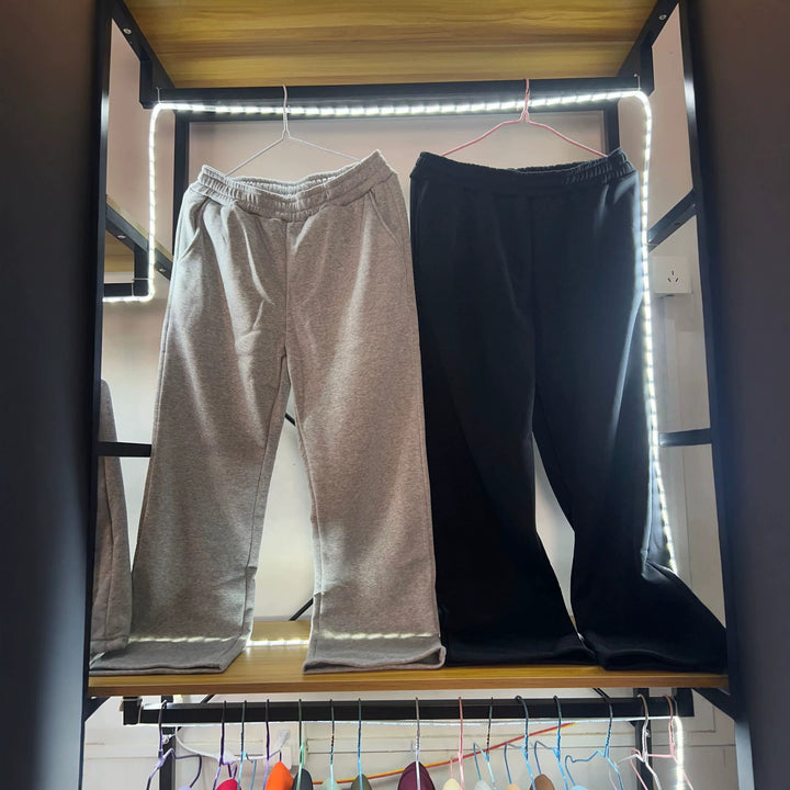 Damen weite Loungehose mit elastischem Bund, seitlichen Eingrifftaschen und fließendem Bein – Avélisse