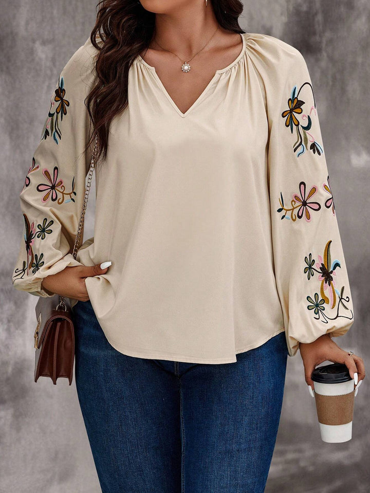 Damen Locker sitzende V-Ausschnitt Bluse mit floraler Stickerei an Ballonärmeln – Élovi