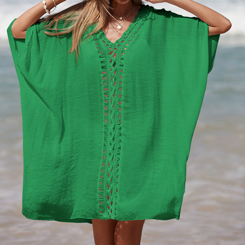 Damen eleganter Strandponcho mit raffinierten Häkelakzenten und tiefem V-Ausschnitt Echo Archiv