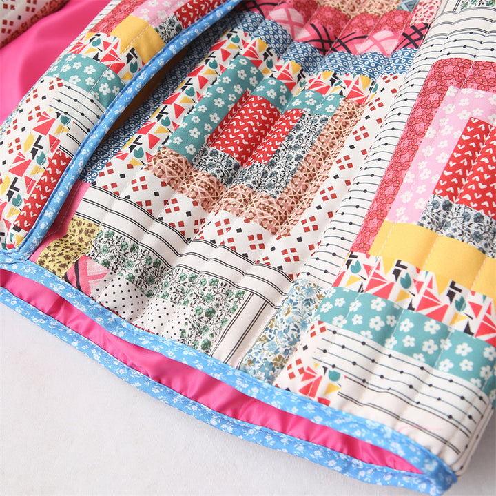 Damen nan gesteppte Cropped Patchworkjacke mit Schalkragen und kastigem Schnitt Echo Archiv