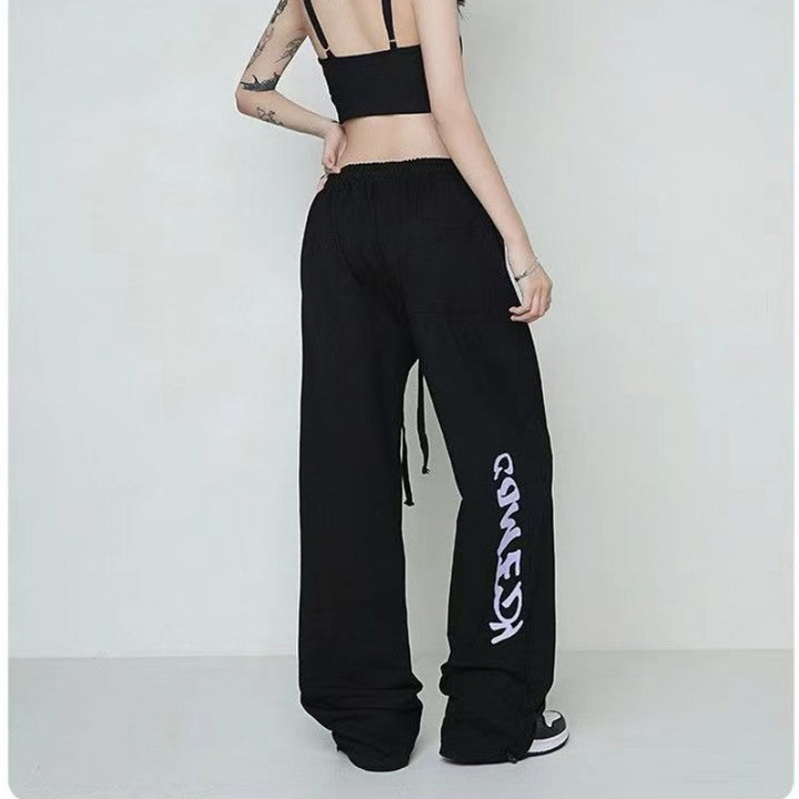 Damen weite Lounge-Hose mit elastischem Bund, Kordelzug und markantem Seitengrafikprint – Avélisse