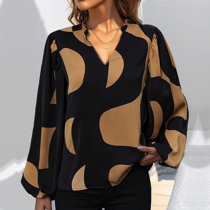 Damen Gemusterte V‑Neck Bluse mit Ballonärmeln und lockerem Fall Echoarchiv