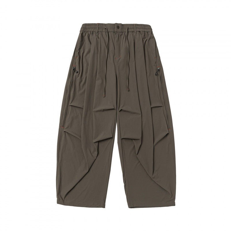 Unisex Weitgeschnittene technische Cargo-Hose mit Gummibund, Kordelzug und Reißverschlusstaschen Echo Archiv