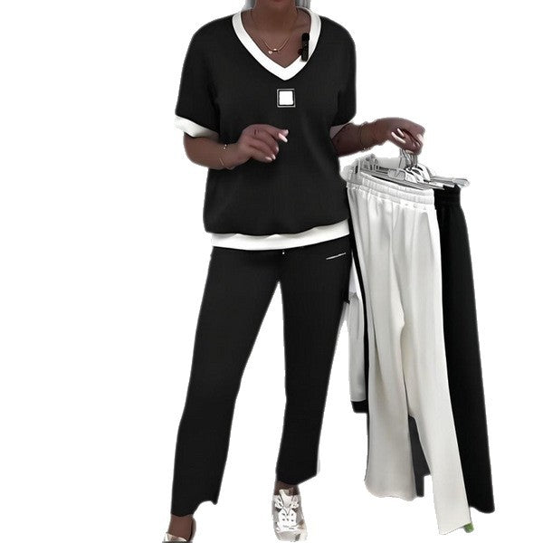 Damen nan zweiteiliges sportlich-elegantes Jersey-Set mit V-Ausschnitt, breiten Bündchen und seitlichem Streifen Echo Archiv