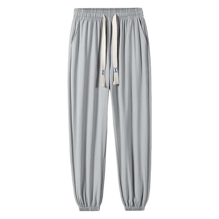 Herren Leichte Relax-Fit-Loungehose aus atmungsaktivem Jersey mit elastischem Tunnelbund, breitem Kordelzug & geripptem Beinabschluss Echoarchiv