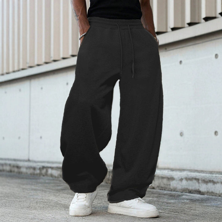 Herren weite Sweatpants im Baggy Cut mit elastischem Bund, Tunnelzug und Eingrifftaschen Echo Archiv