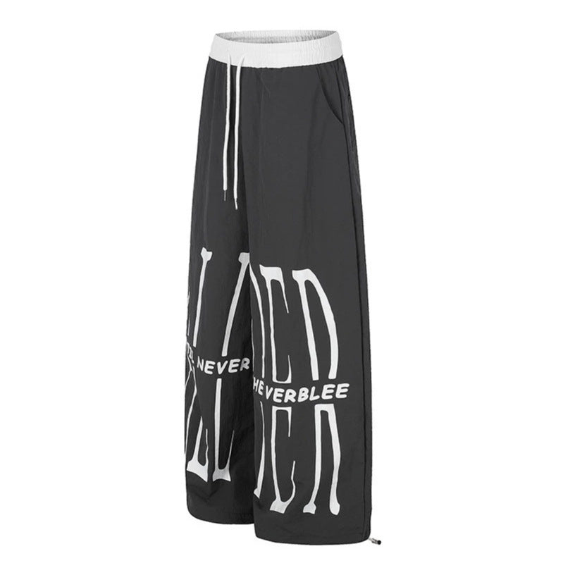 Damen Weite Loungewear-Hose mit hohem Komfortbund, Kordelzug, verstellbarem Saum und typografischem Print Echoarchiv