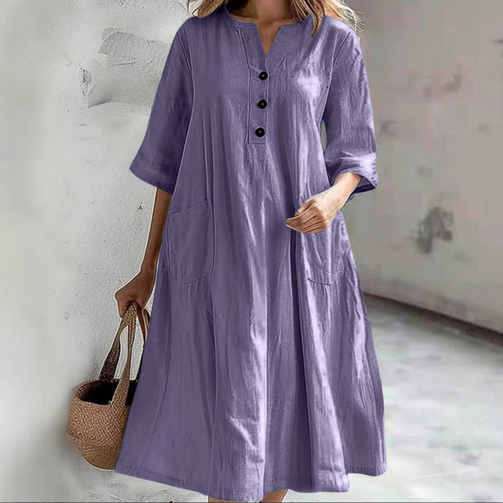 Damen nan locker fallendes A-Linien Kleid mit V-Ausschnitt-Knopfleiste, 3/4-Ärmeln und aufgesetzten Eingrifftaschen Echo Archiv