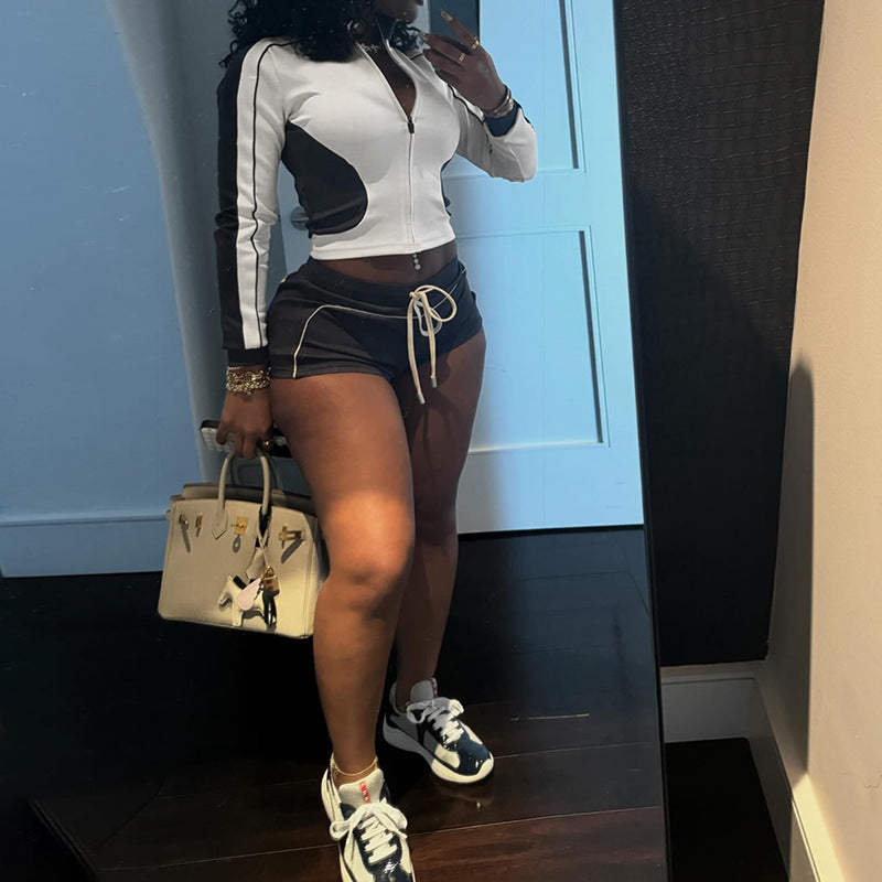 Damen Sportliches Kurzarm-Set mit Reißverschluss und Shorts Echo Archiv