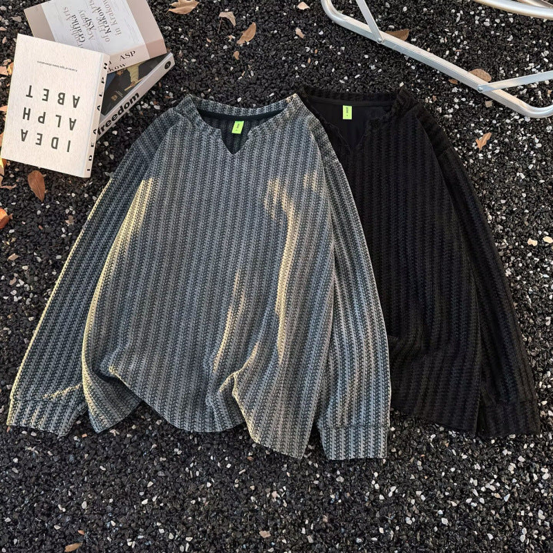 Damen Feinstrick-Pullover mit feiner Waffelstruktur, V-Notch-Ausschnitt und legerer Oversize-Passform Echoarchiv