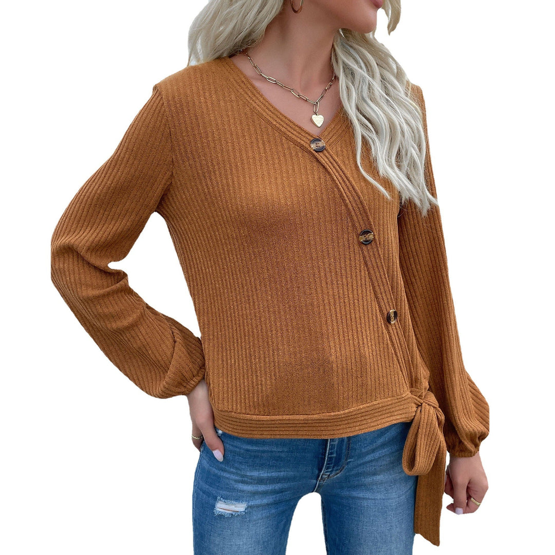 Damen Gerippte Wickel-Strickjacke mit V‑Ausschnitt, asymmetrischer Knopfleiste und Taillenband Echoarchiv
