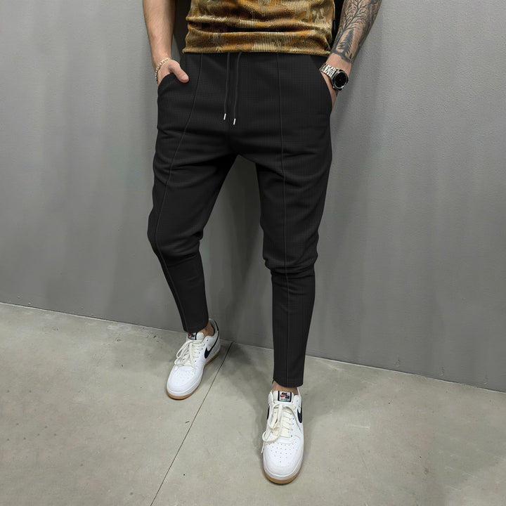 Herren elegante Jogginghose mit stylishen Details Echoarchiv