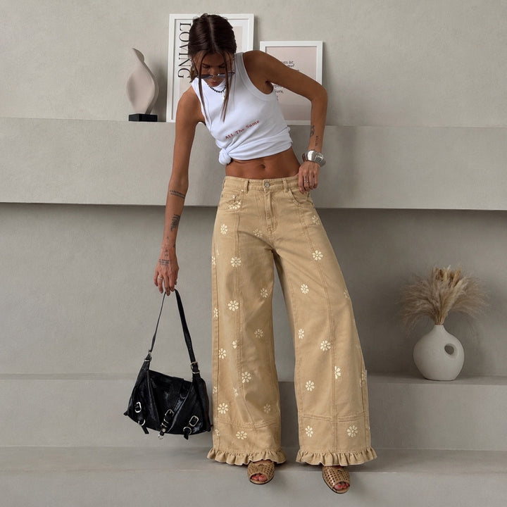 Damen weite Denimhose mit Gänseblümchen-Print, hohem Bund und Rüschenabschluss – Avélisse
