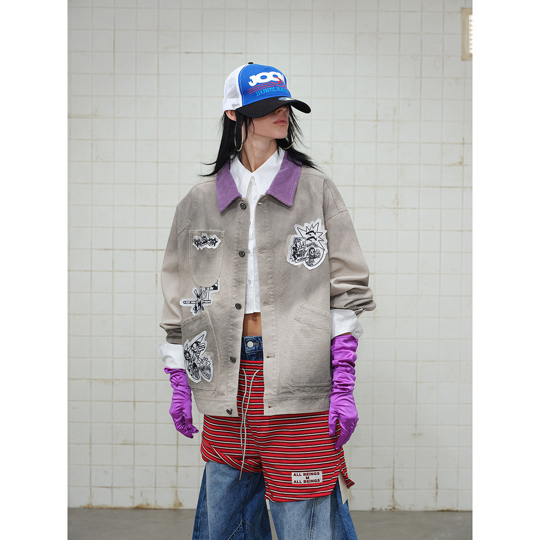 Unisex Kastig geschnittene Chorejacke aus Baumwollcanvas mit artistischen Patch Applikationen und Cordkragen Echoarchiv