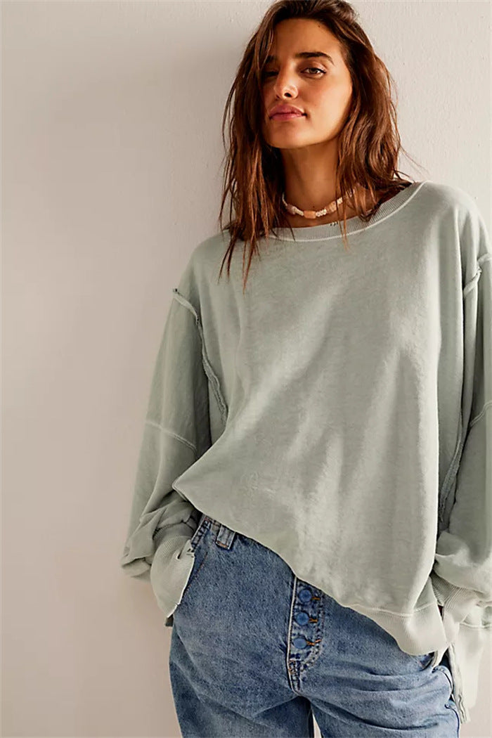 Damen oversized Sweatshirt mit Ballonärmeln, offenen Saumnähten und seitlichen Schlitzen – Avérine