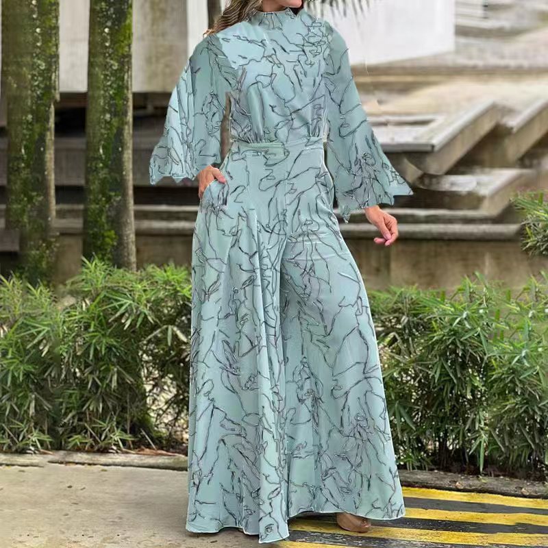 Damen Eleganter Longline Jumpsuit mit Stehkragen, Ballonärmeln und Seitentaschen Echoarchiv