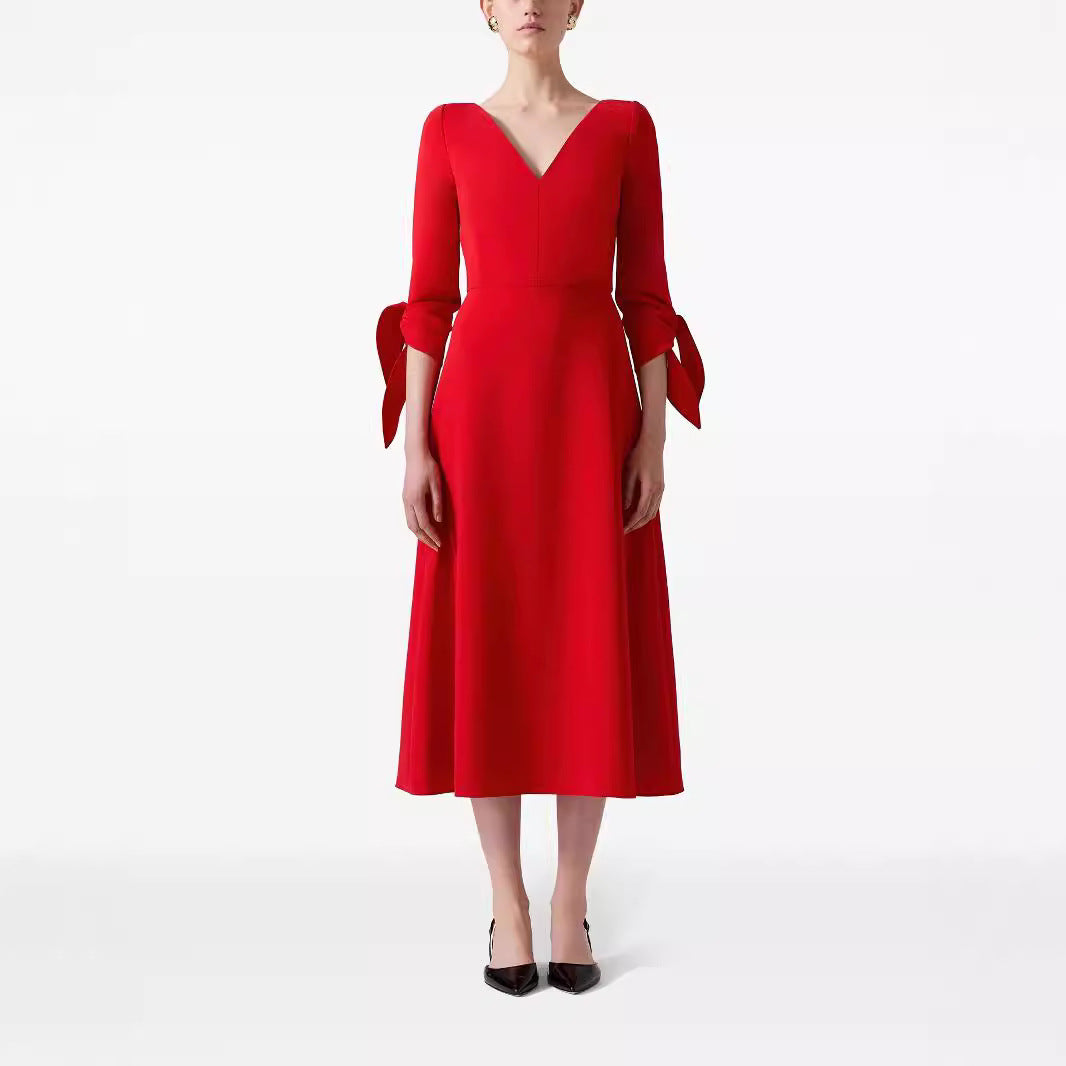 Damen Tailliertes Midikleid mit V-Ausschnitt und Schleifenmanschetten Echoarchiv