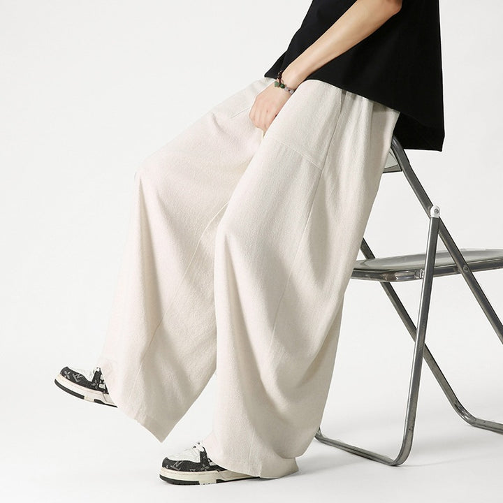 Herren Weit geschnittene Lounge-Hose mit Quasten-Kordel, elastischem Bund und aufgesetzten Taschen Echo Archiv